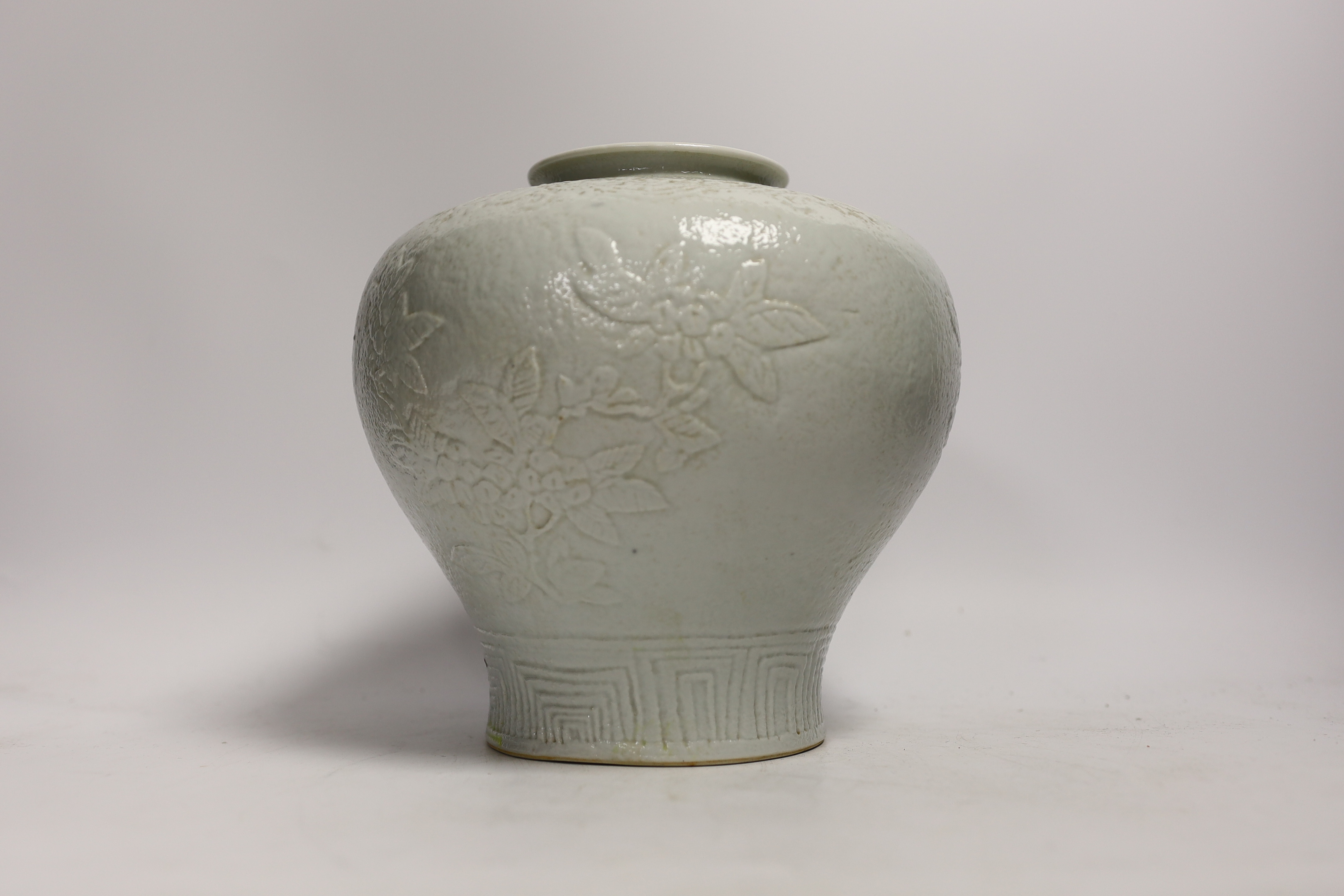 A Chinese moulded white porcelain meiping, Republic period, 20cm